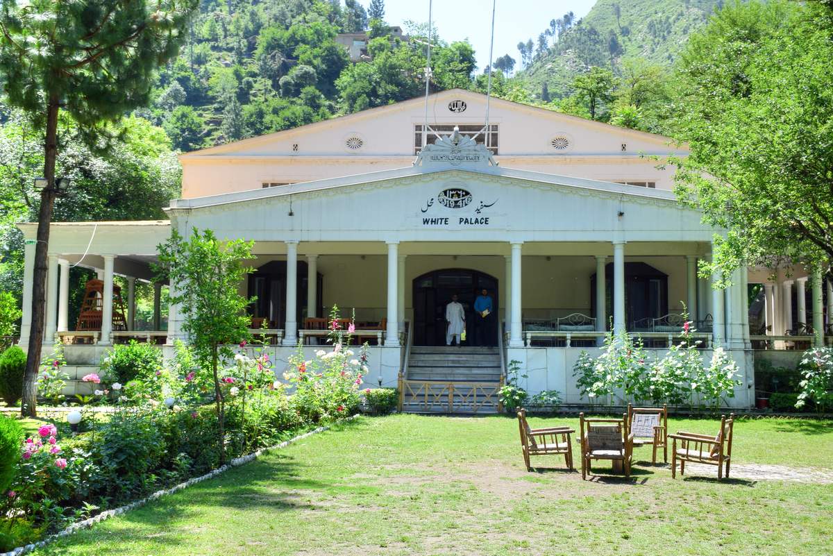 Front of the White Palace in Marghazar, Swat, with its garden and rose beds